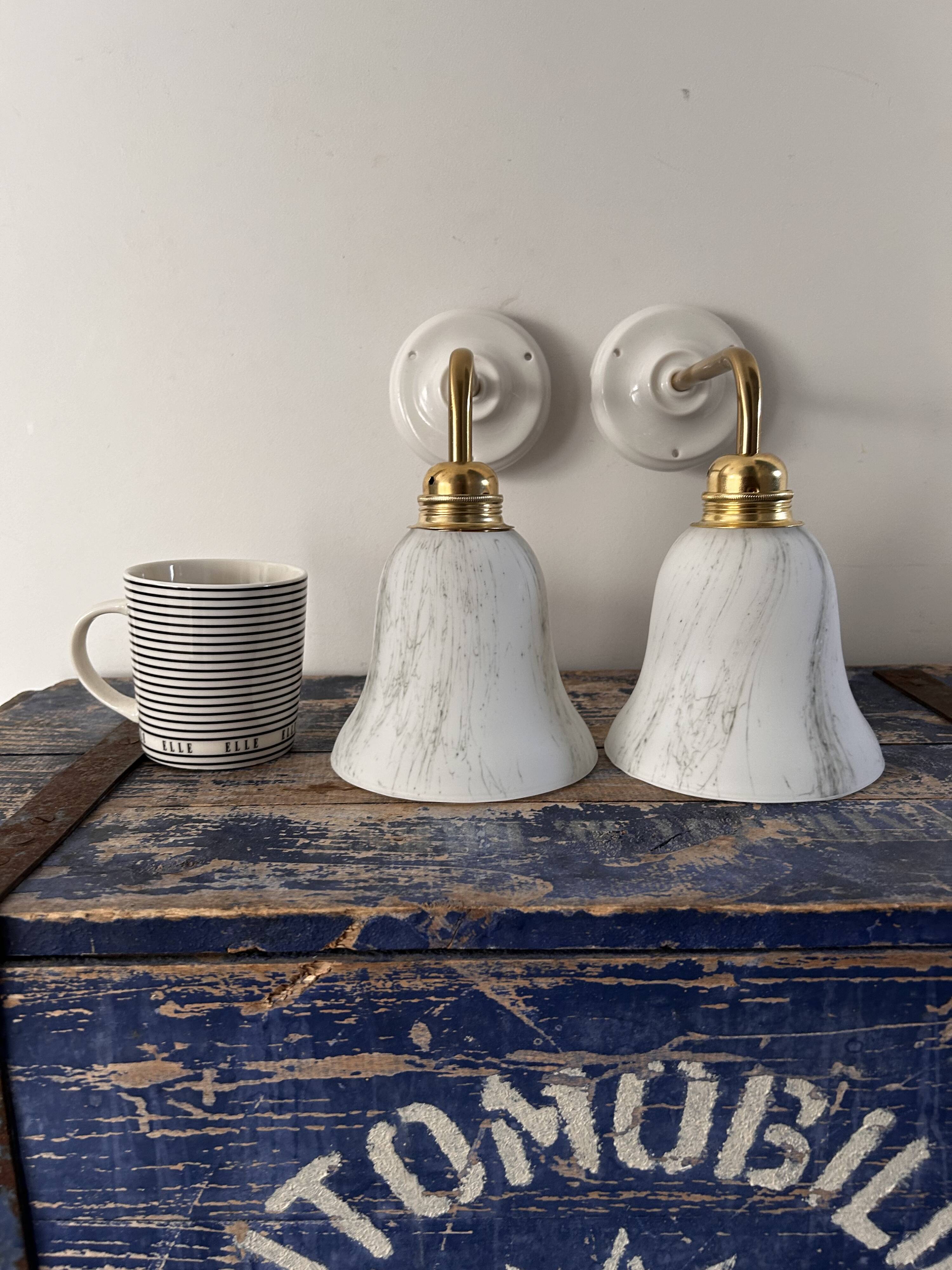 Pair of brass and opaline wall lights