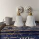 Pair of brass and opaline wall lights