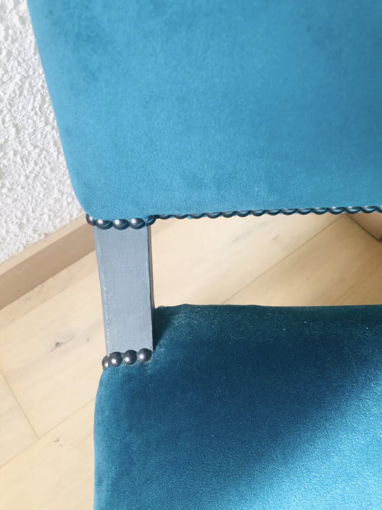 Velvet and studded armchair