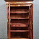 Louis Philippe period wardrobe (nineteenth) entirely covered with gilded bronzes