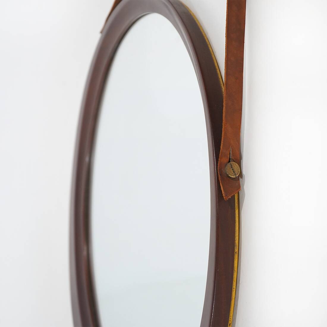Round wall mirror with leather strap, 1960s