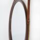 Round wall mirror with leather strap, 1960s