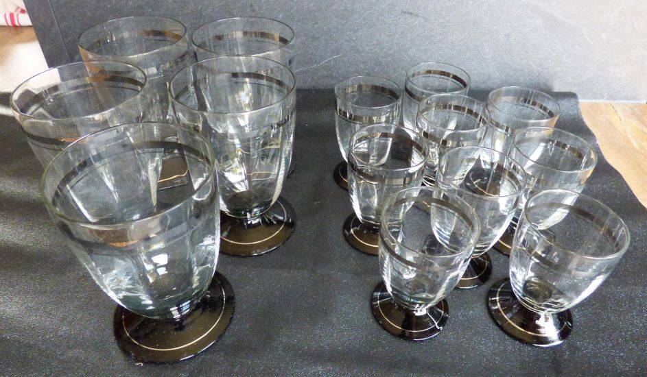 2 series of vintage glasses with black stems from the 1930s.