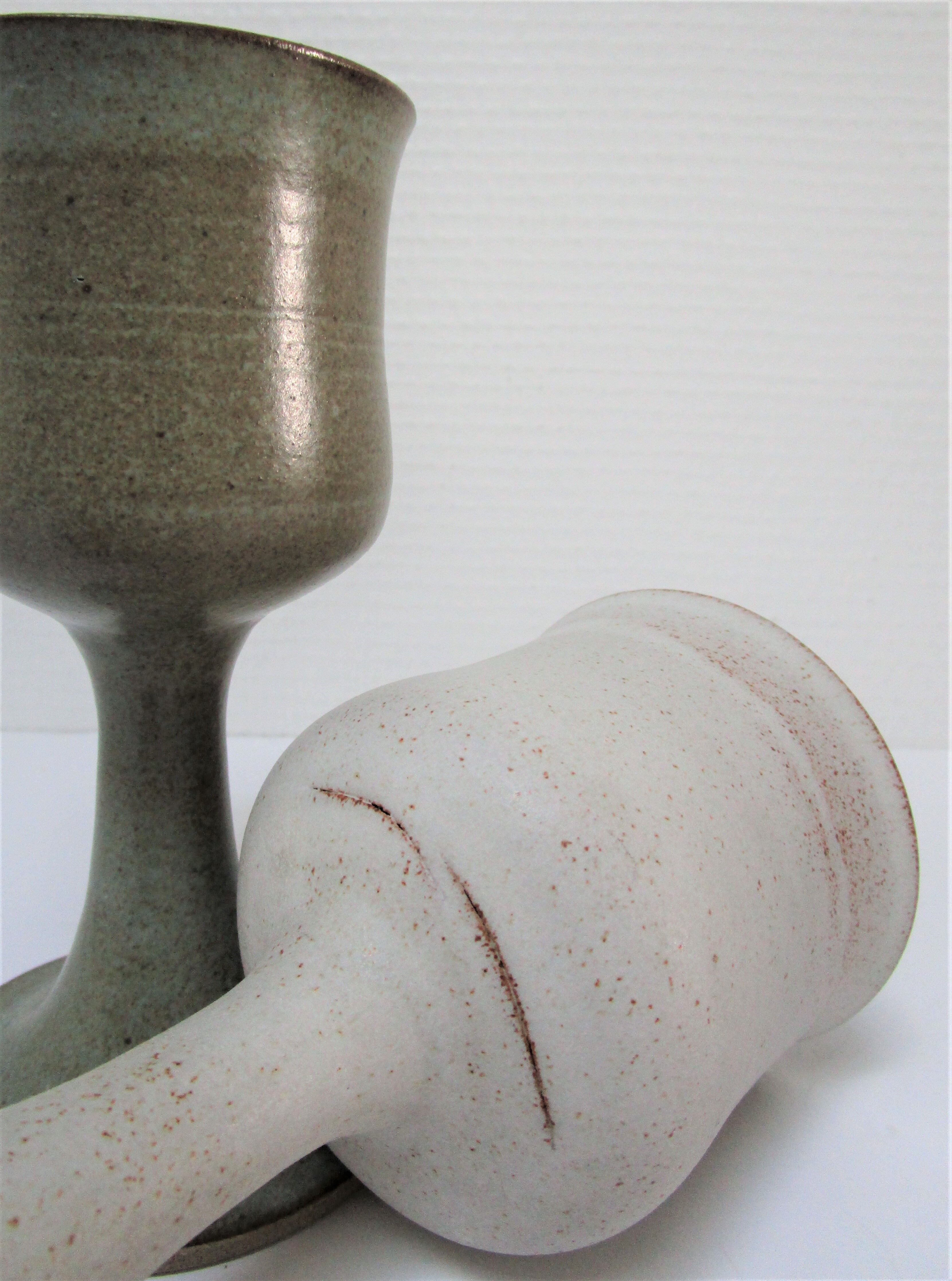 Two enamelled ceramic walking glasses