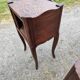 Pair of oak bedside tables with curtained niche doors
