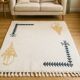 Ecru Berber rug with symbolic corner patterns.