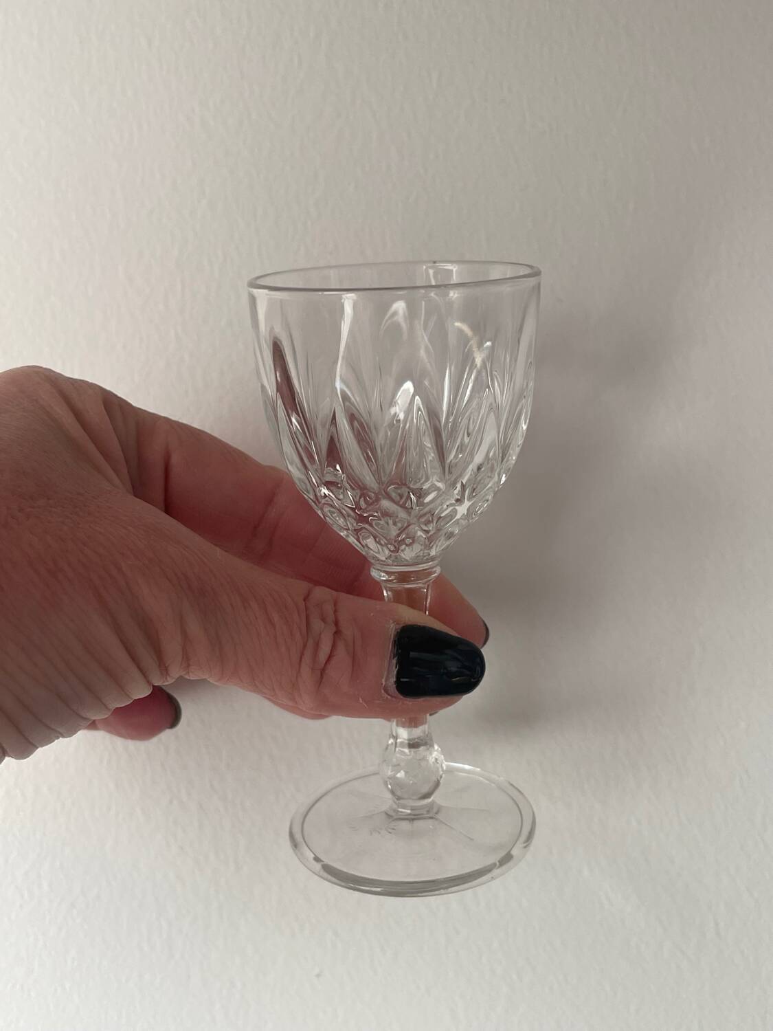 4 cut glass liqueur glasses on stems