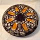Round plate Vallauris glazed ceramic in brown and orange and Fat Lava A036