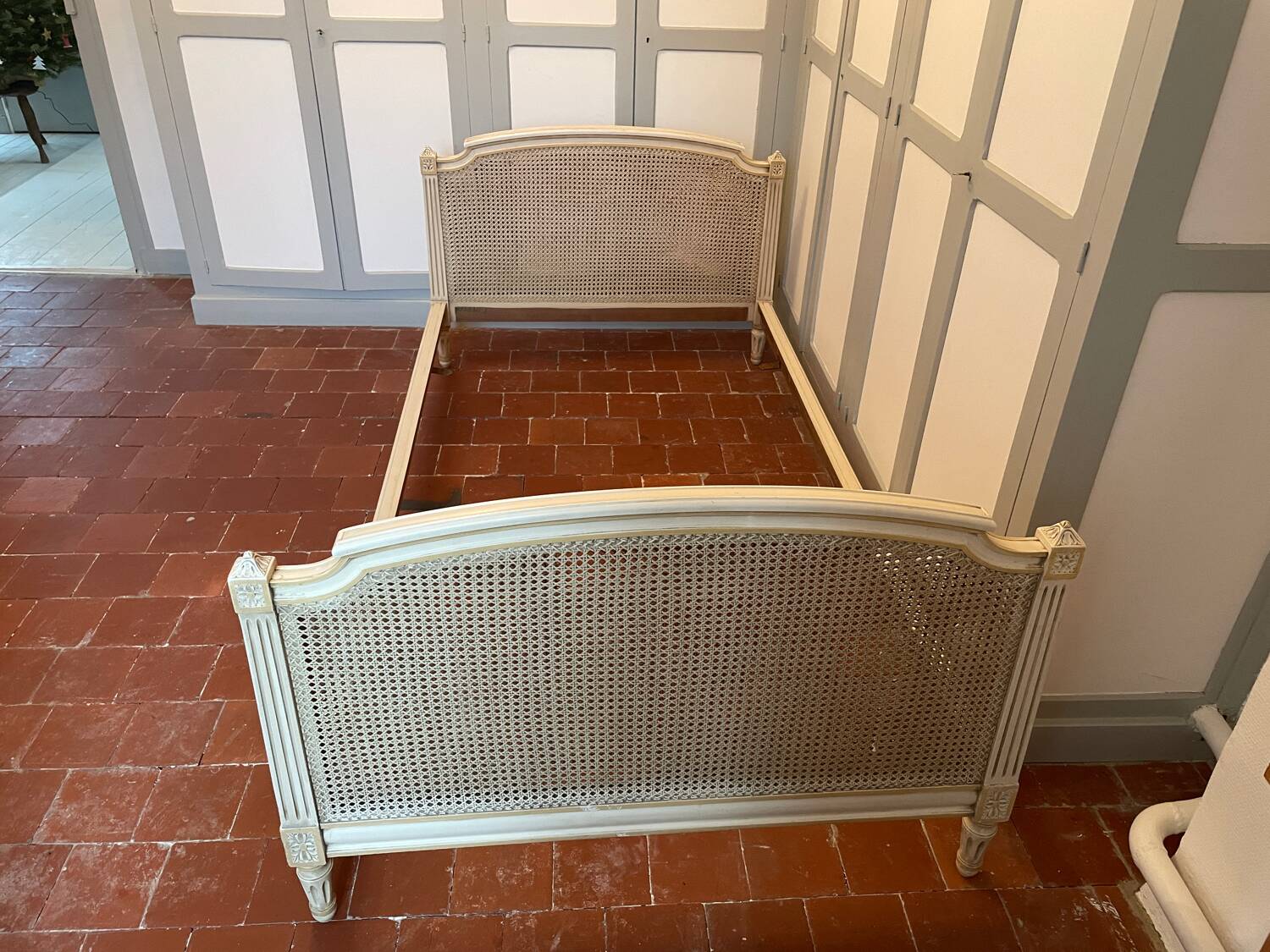 Louis XVI cane and wood bed