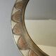 Large round Moroccan mirror in chiseled brass and copper, 1970s-1980s