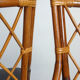 Pair of rattan and black skai bamboo chairs, 60s