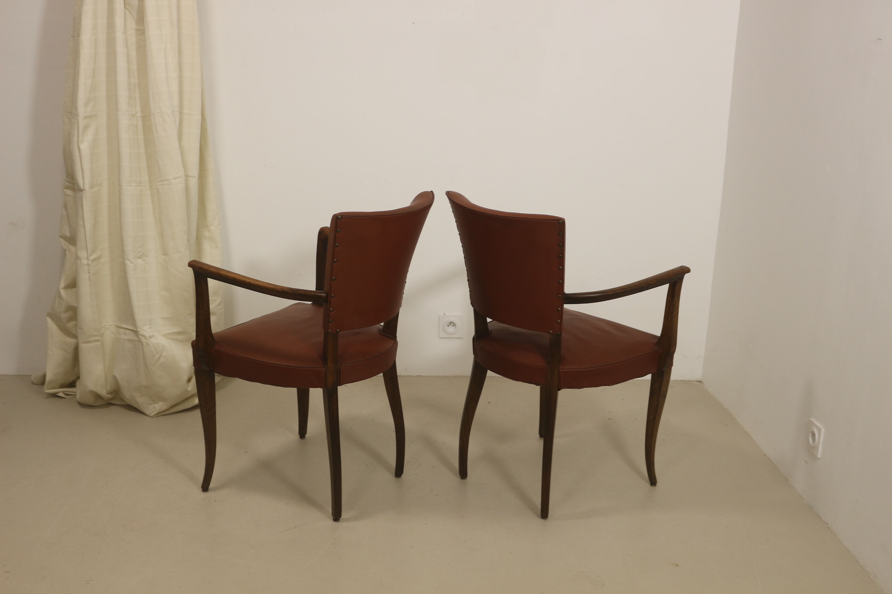 Pair of vintage bridge armchairs year 60 in imitation rust leather.