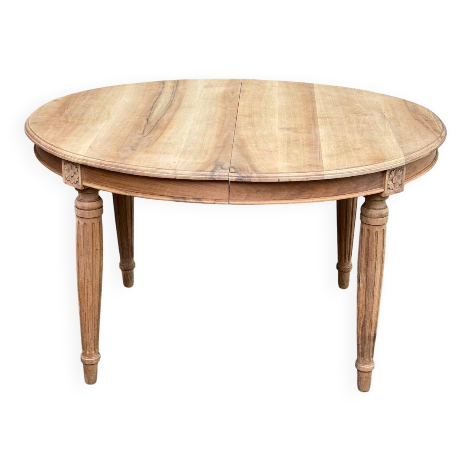 Art Deco round extendable dining table stripped in solid walnut from the 1920s.