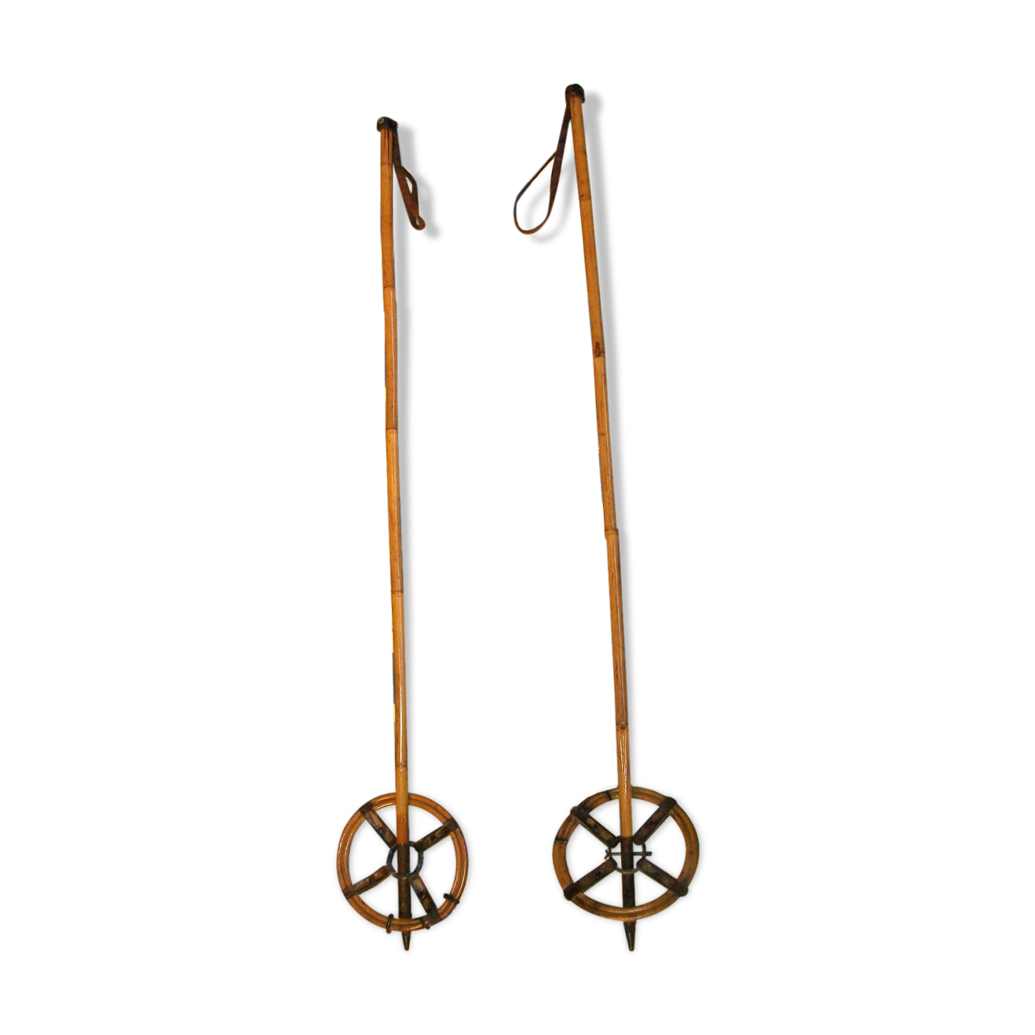 Old pair of ski reed leather stick