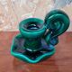 Green earthenware candle holder