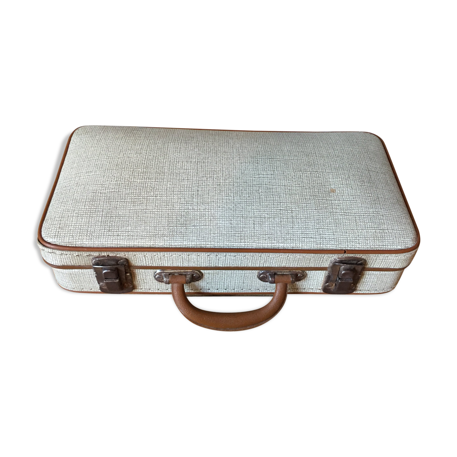 Old set of wooden balls in his suitcase
