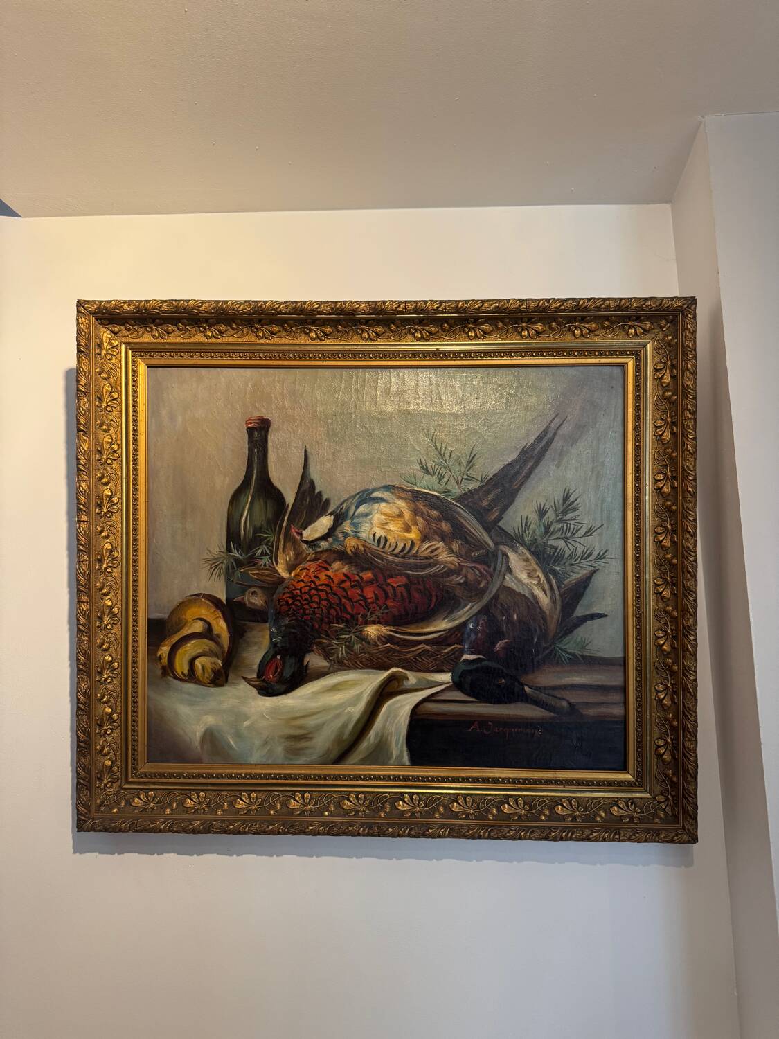 Still life with bottle and game, signed, 20th century