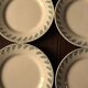 A set of 8 small plates Terre de Fer flowers green Choisy le Roi