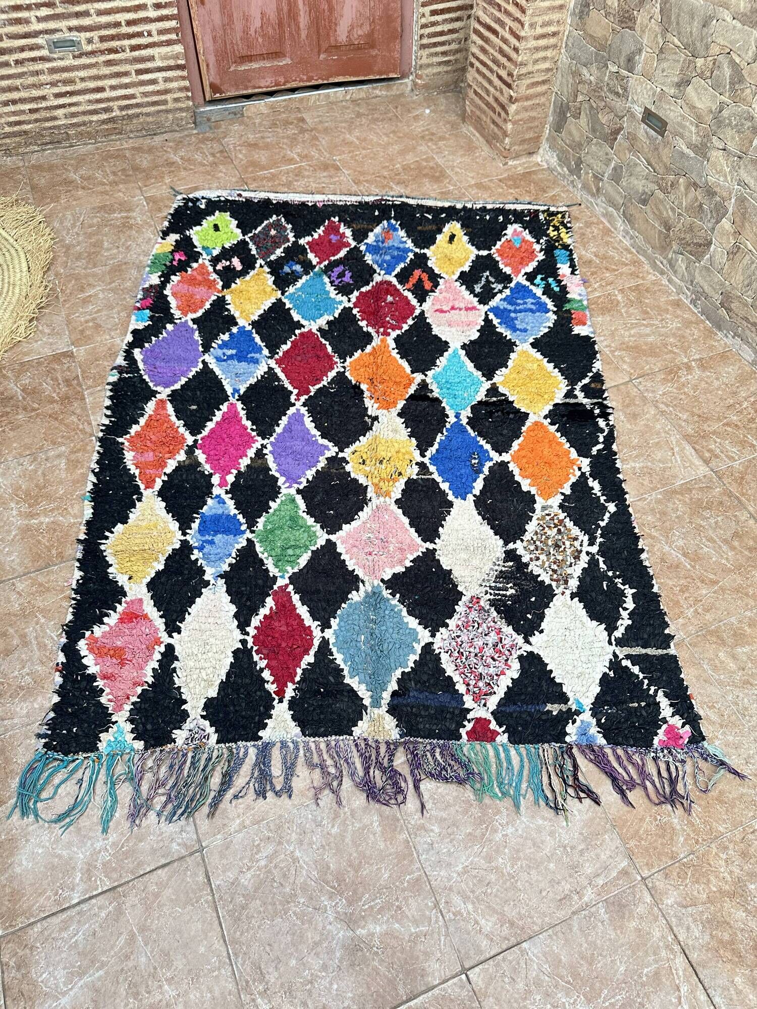 Vintage Boucherouite Berber rug: Hand-knotted Moroccan rug.