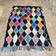 Vintage Boucherouite Berber rug: Hand-knotted Moroccan rug.