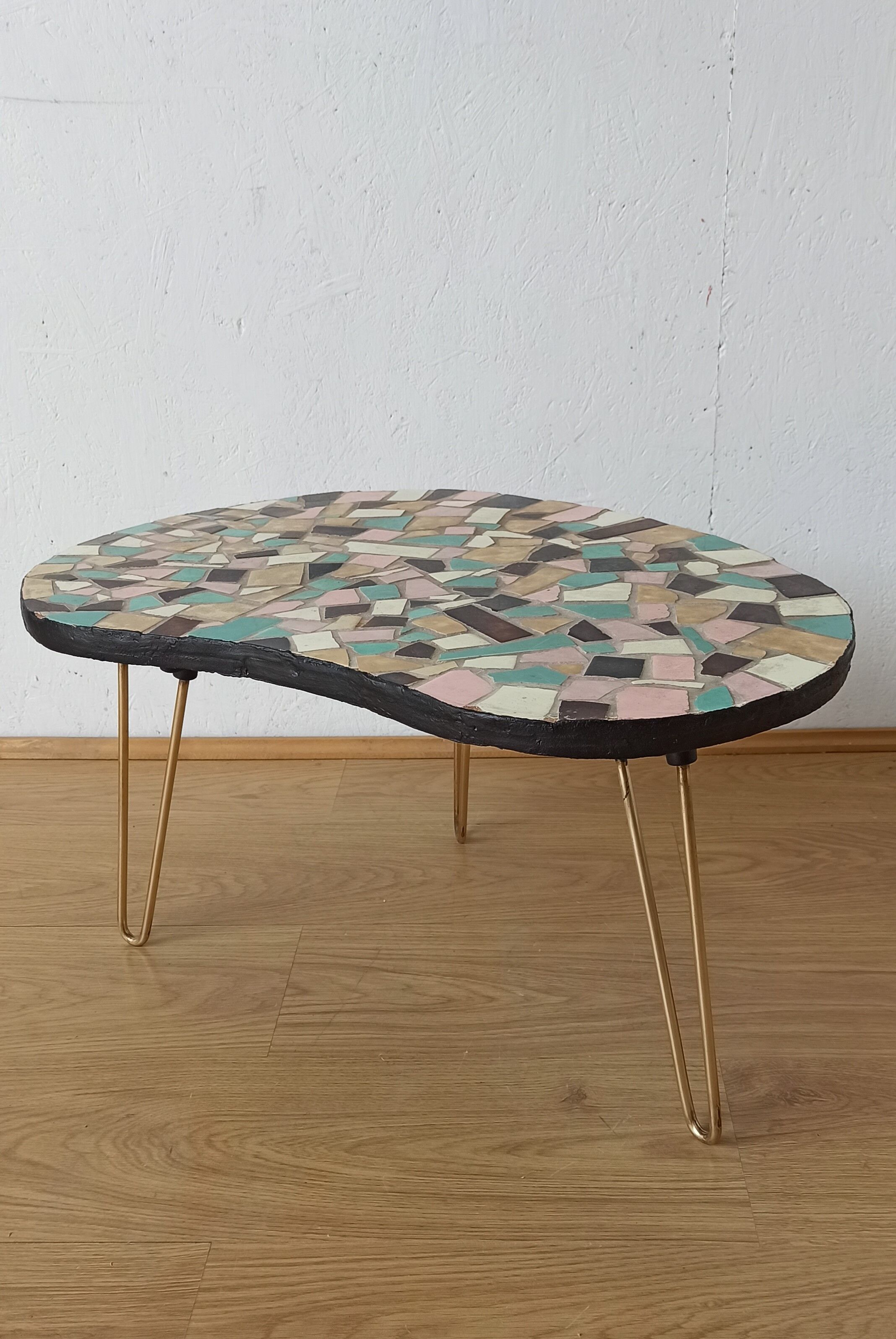Unusual coffee table on three legs