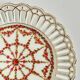 Pair of openwork porcelain plates decorated with roses