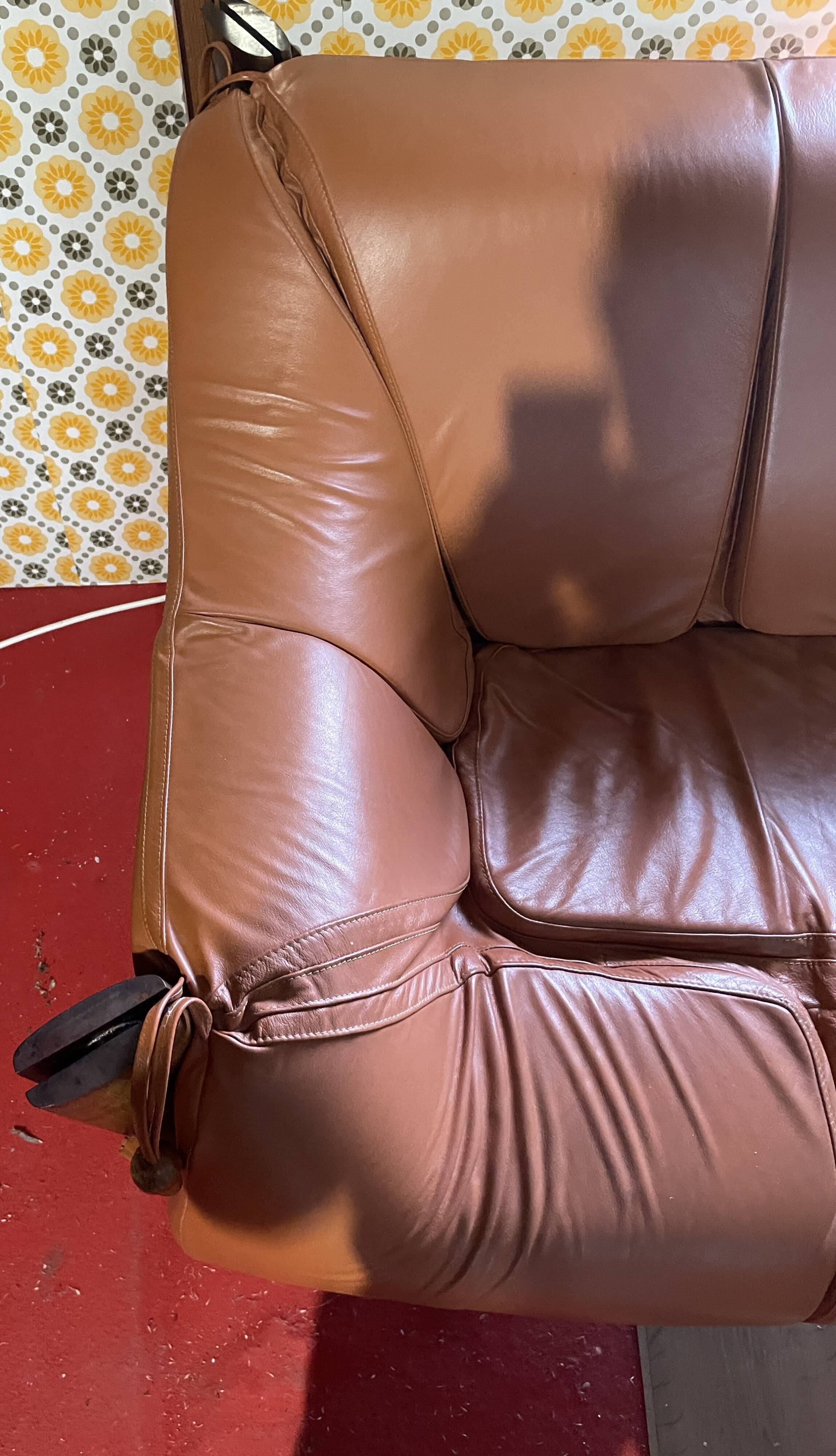 Percival lafer mp-211 sofa set with two armchairs and an ottoman in leather.