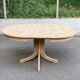 Renovated Scandinavian dining table in solid oak with a central leg from the 1970s.