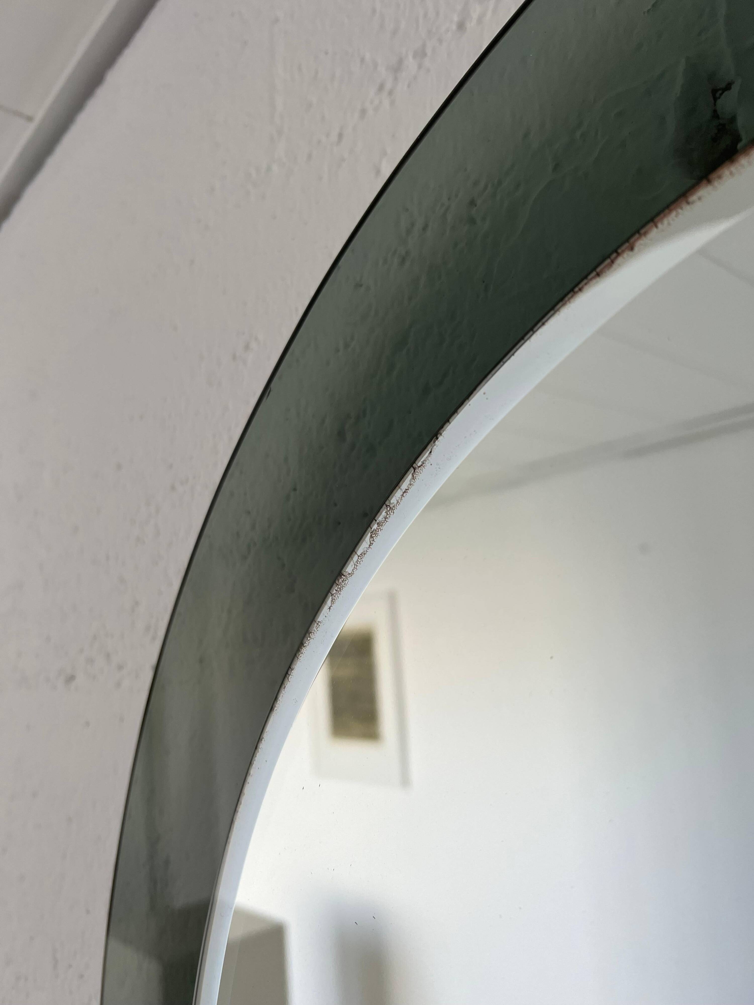 Decorative round wall mirror in smoked glass, Space Age Italian collectible