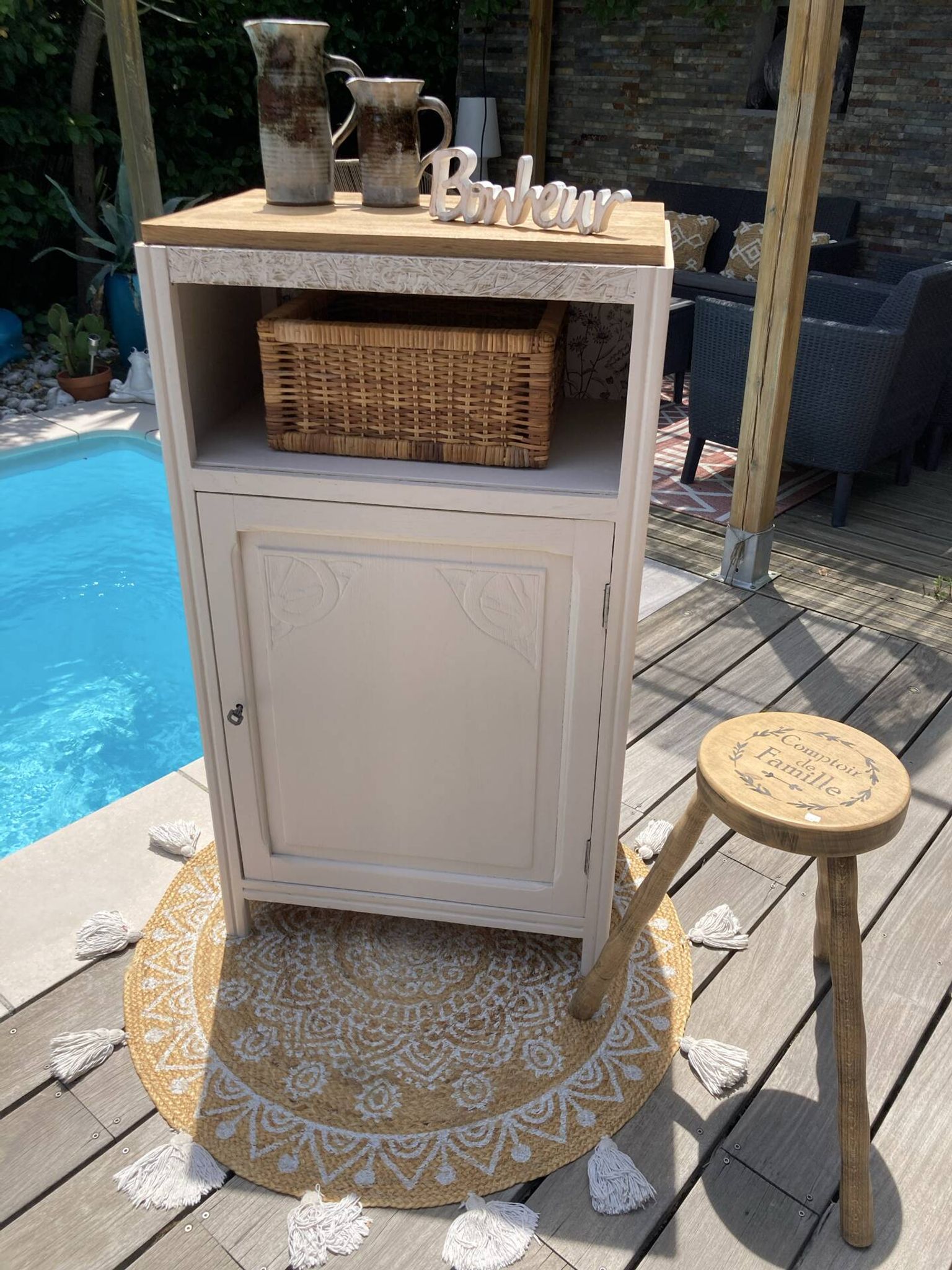 Beautiful art deco jam cupboard in delicate beige tone / and wicker basket