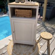 Beautiful art deco jam cupboard in delicate beige tone / and wicker basket