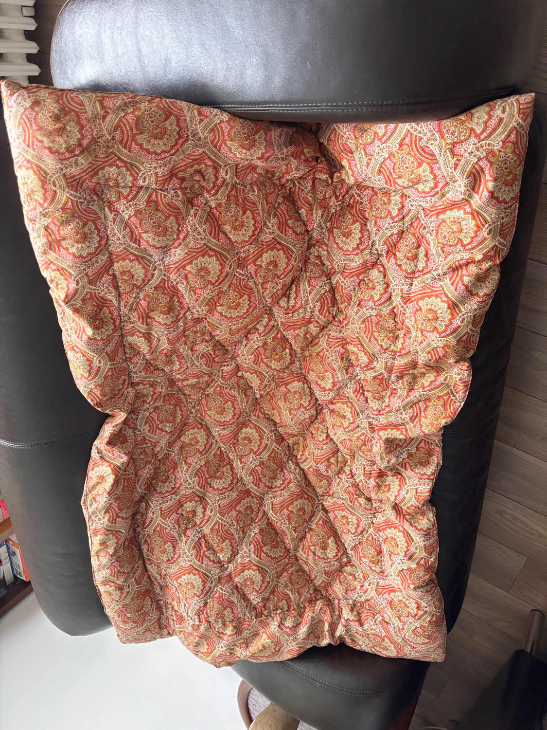 Vintage duvet/bedspread with a paisley pattern.