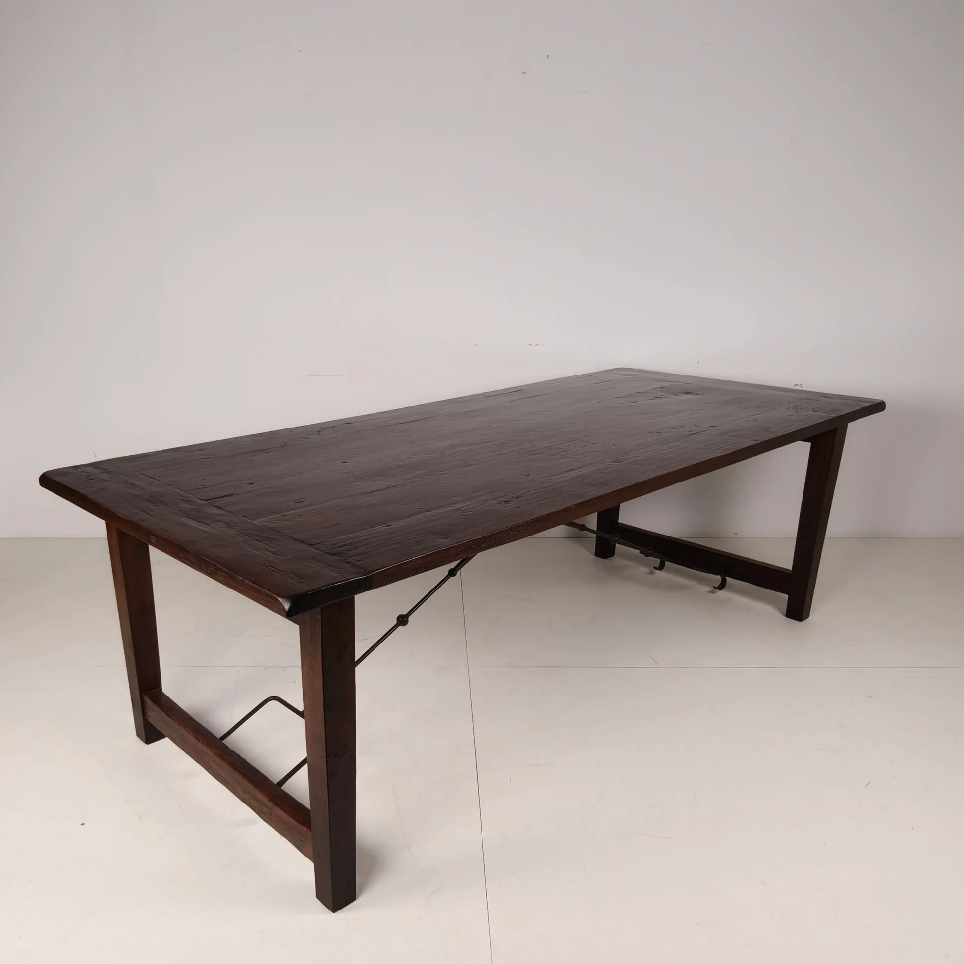 Large Spanish oak dining table with wrought iron bars – 20th century