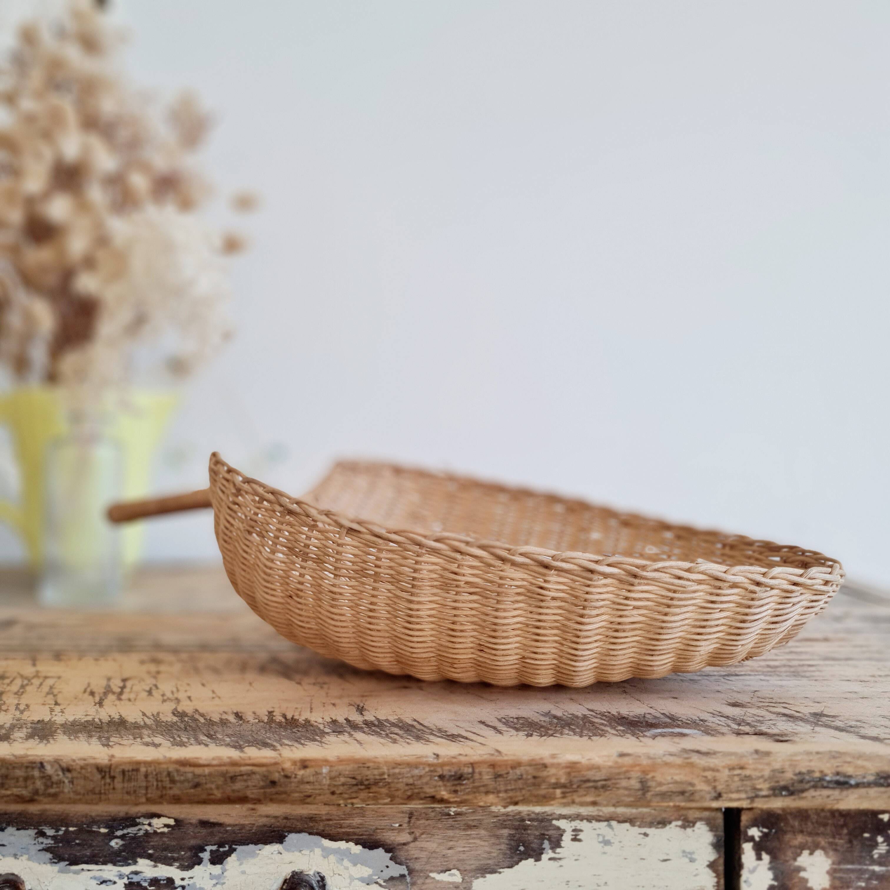 Antique rattan basket - bowl emptier
