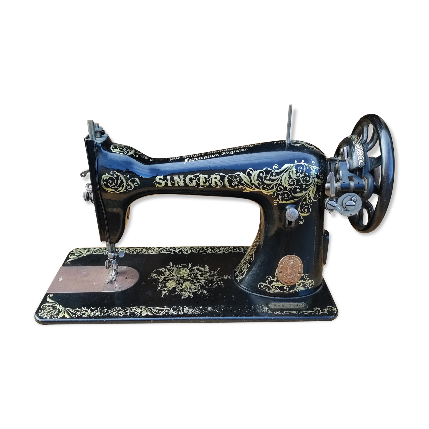 Old Singer sewing machine on pedestal