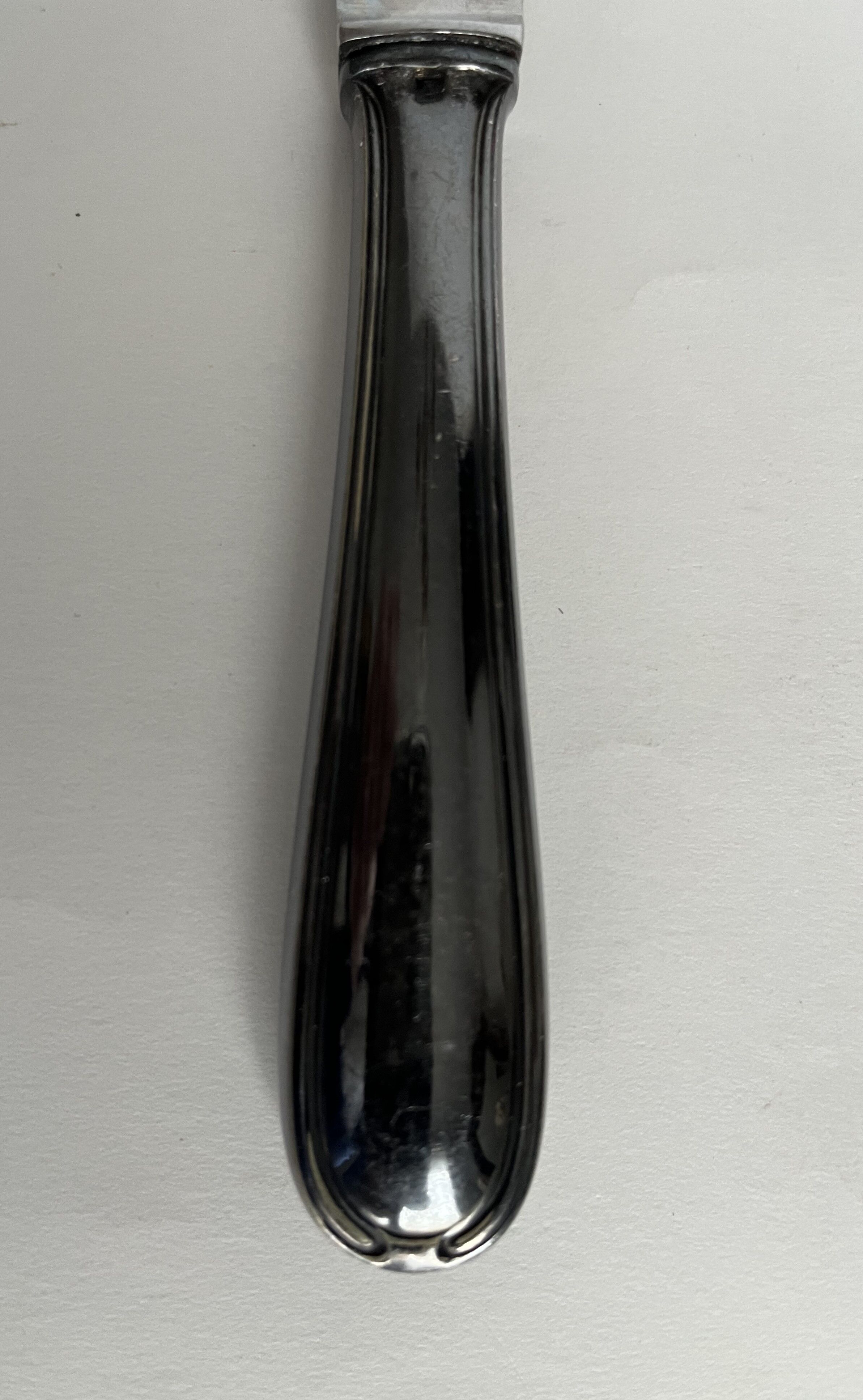 6 silver metal table knives