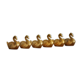 6 Golden swans bear name