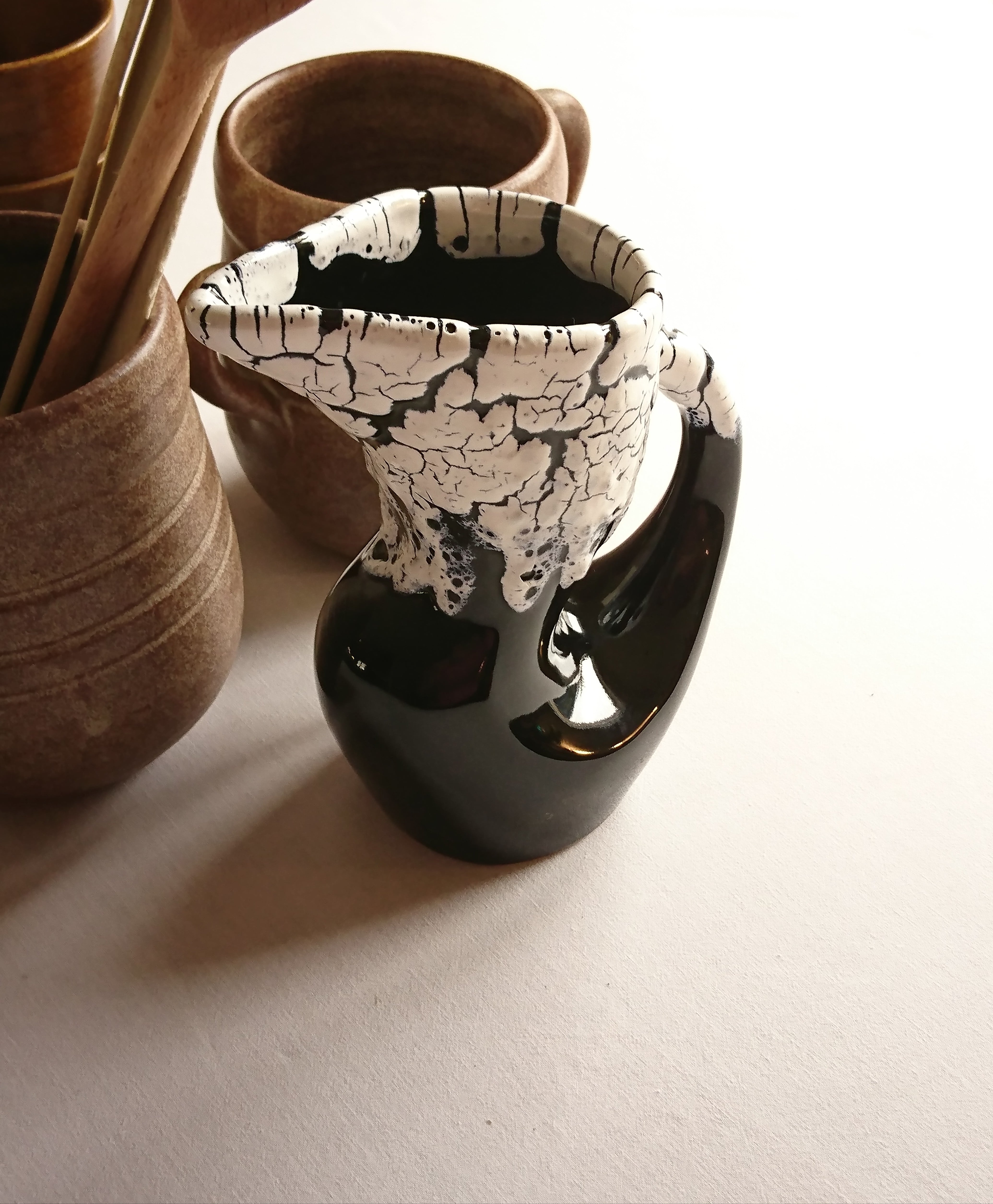 Ceramic pitcher fat lava midnight blue and white signed