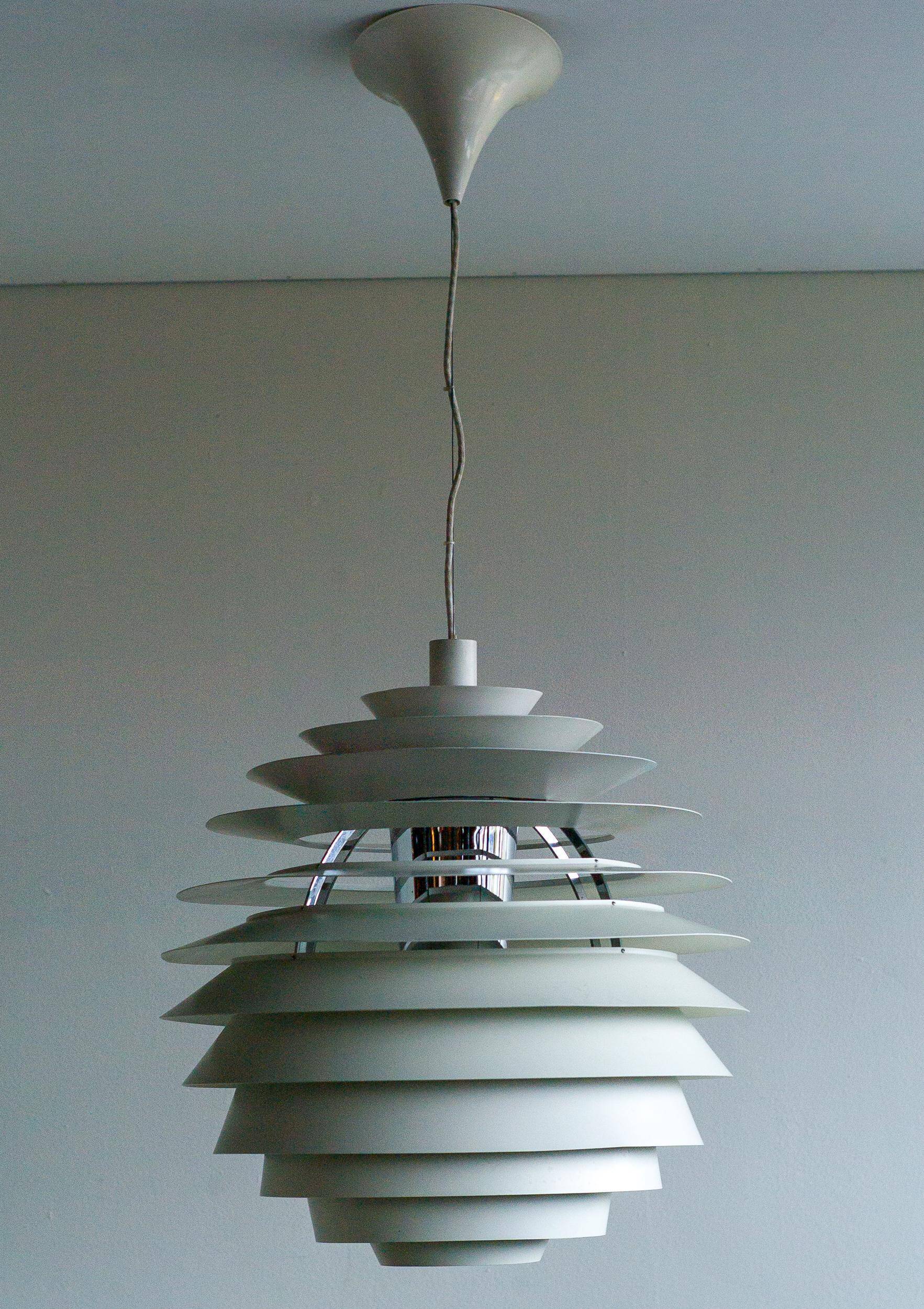 Large pendants from the early last century from the Louvre by Poul Henningsen for Louis Poulsen, 1962.