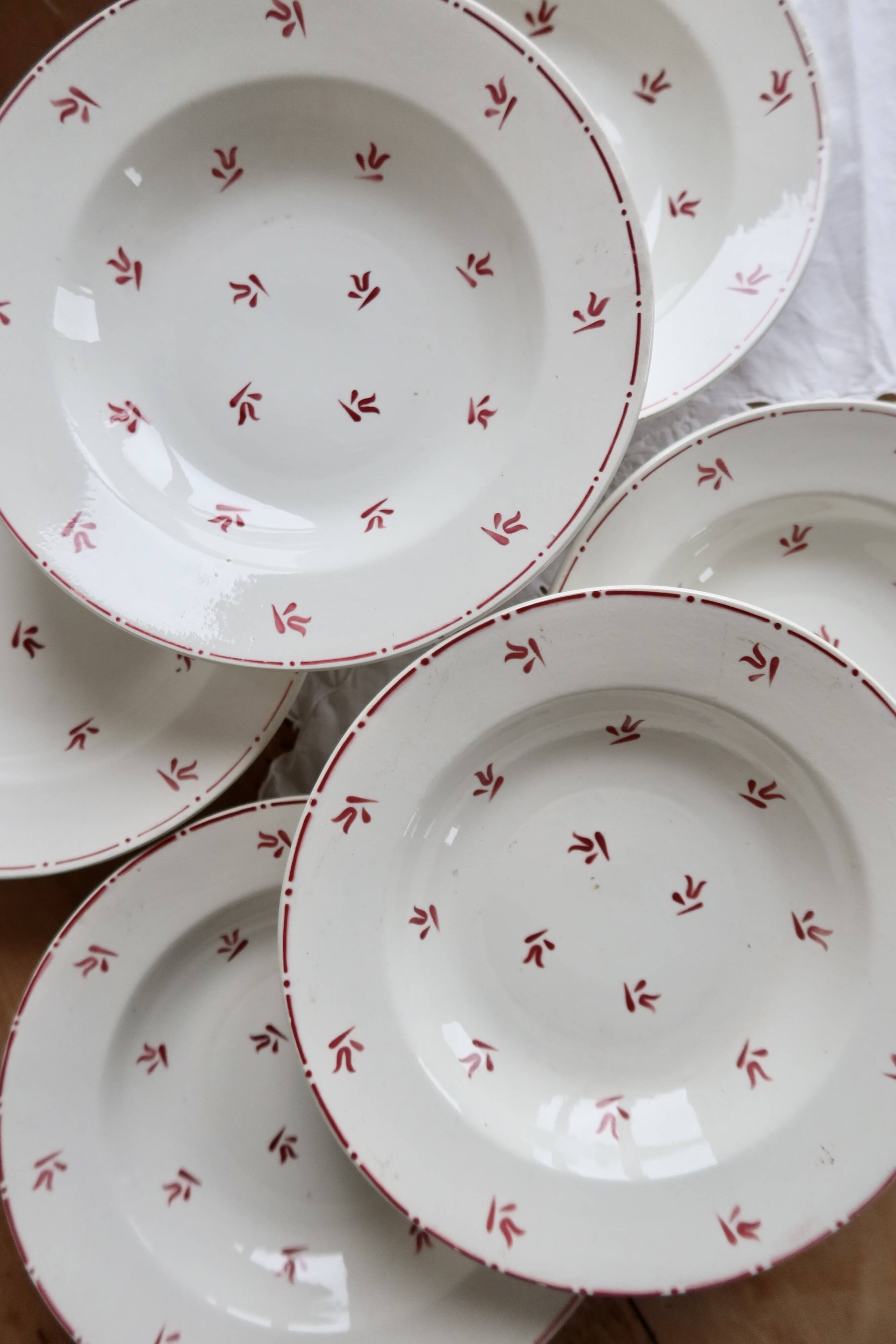 6 vintage white earthenware deep plates with red patterns