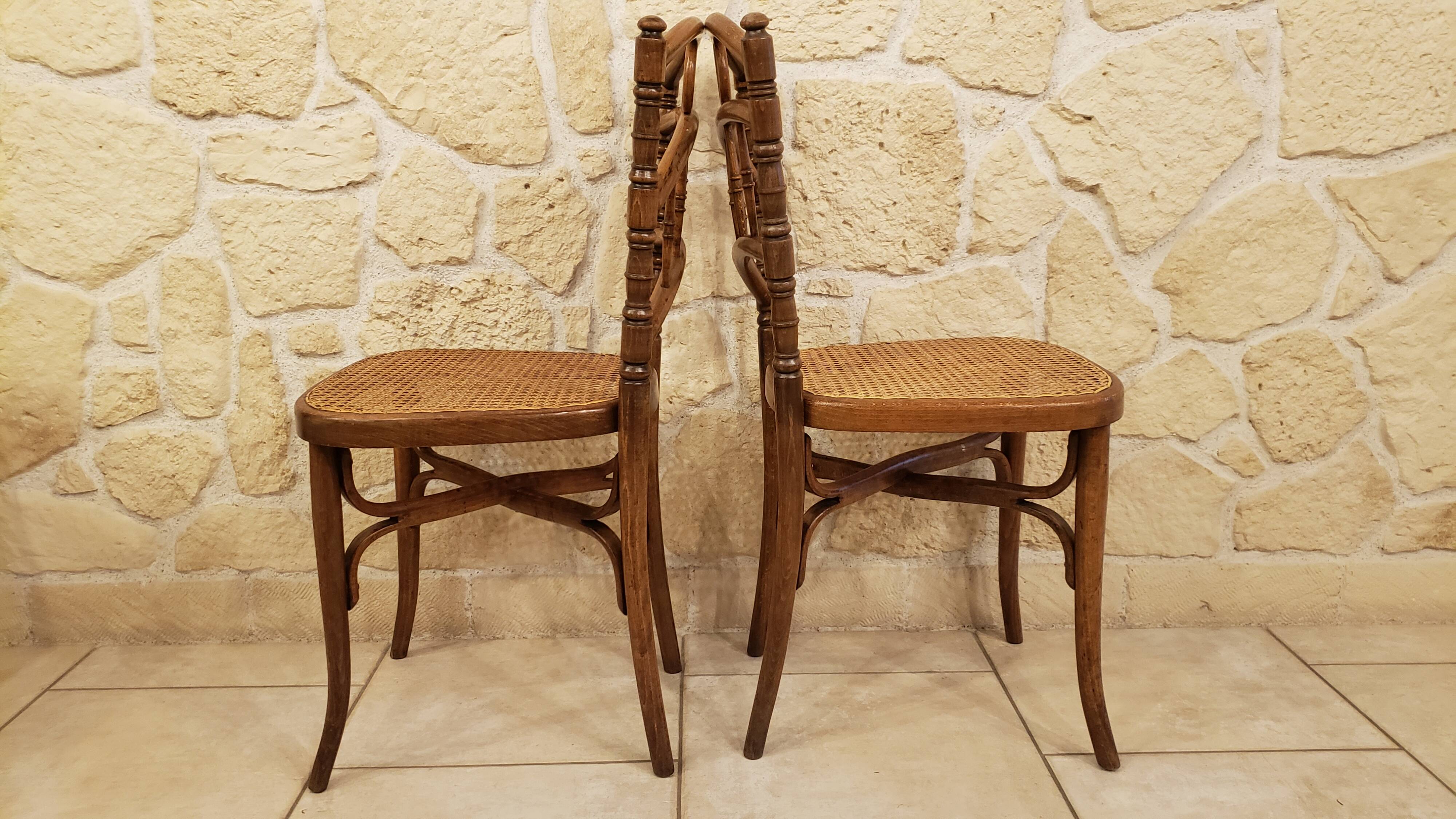 Pairs of old caned bistro chairs cambier n°229