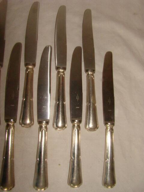 12 table knives with trilobate handles by the brand "G.Vivier"