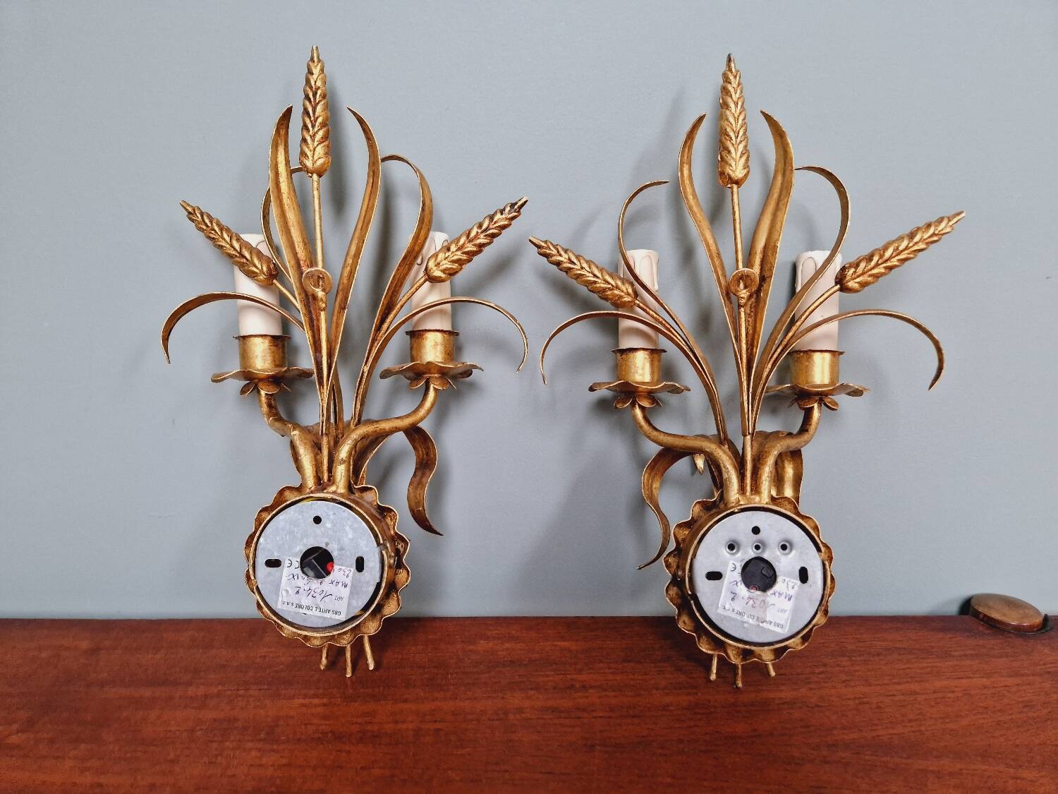 Pair of Italian wall sconces in gilded metal