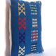 woven velvet cushion, very lively thanks to its bright colours.