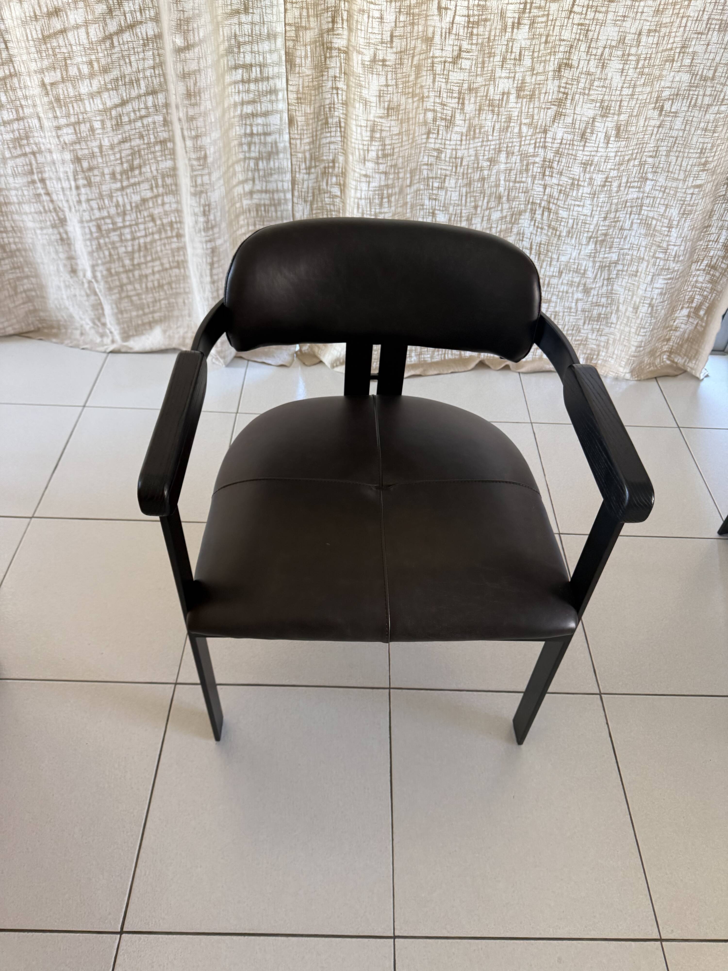 Set of 2 black leather and metal armchairs