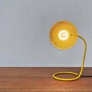 Perforated metal table lamp in Mid-Century Modern style, in the style of Mathieu Matégot, 1960s.
