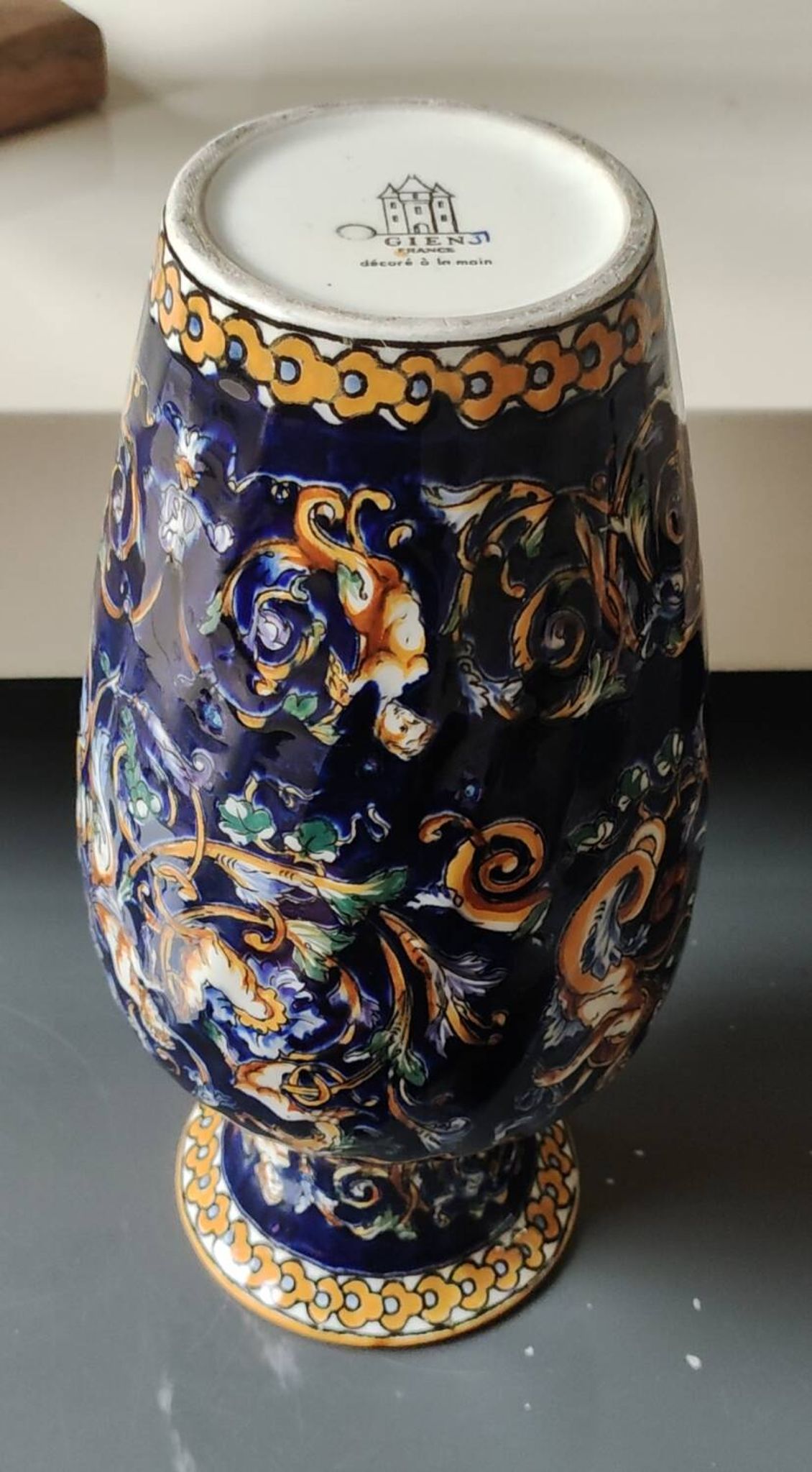 Twisted design vase. Signed Gien France/Renaissance blue background 26 x 13cm
