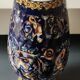 Twisted design vase. Signed Gien France/Renaissance blue background 26 x 13cm
