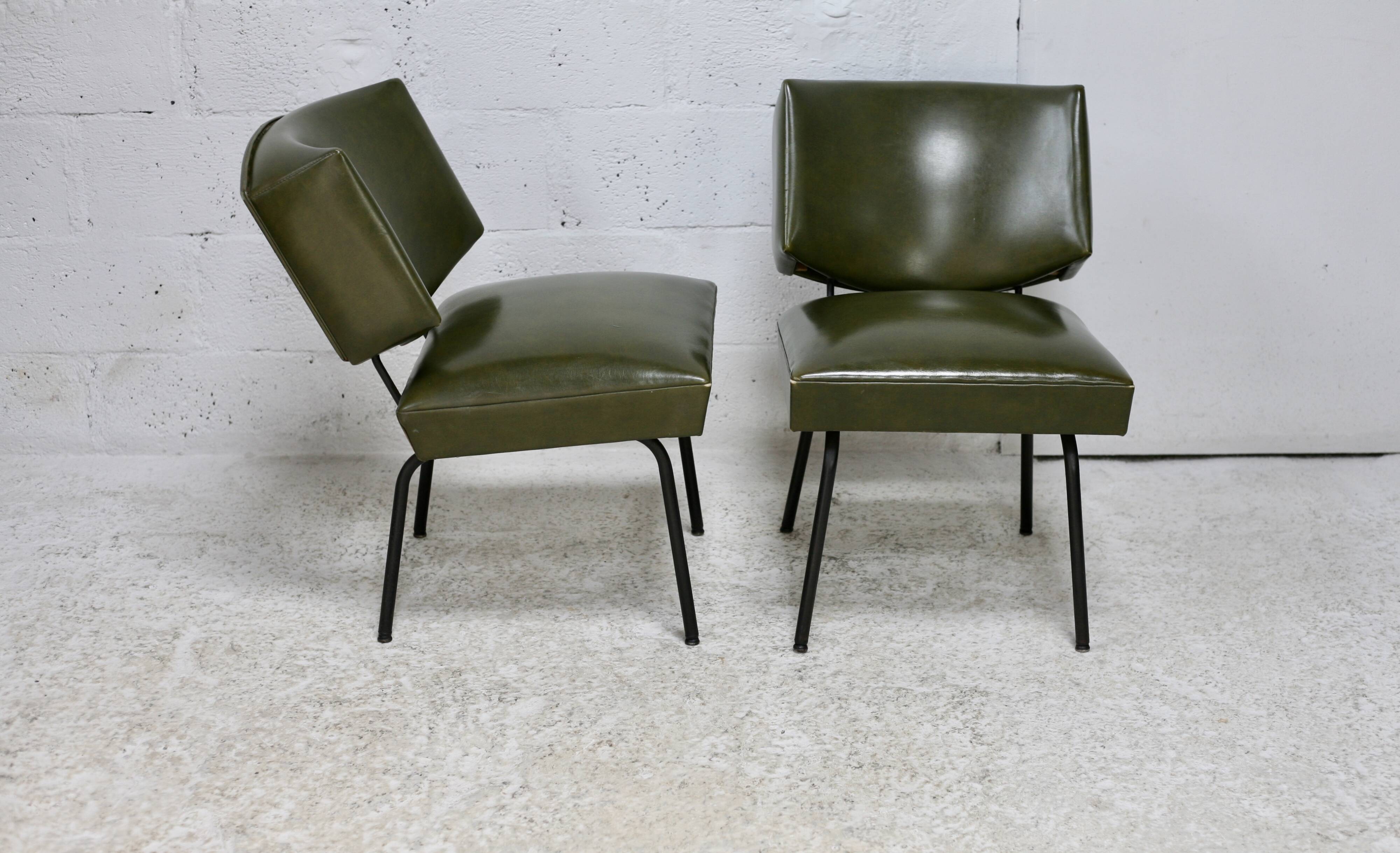 Pair of tubular armchairs, imitation leather. Circa 1950