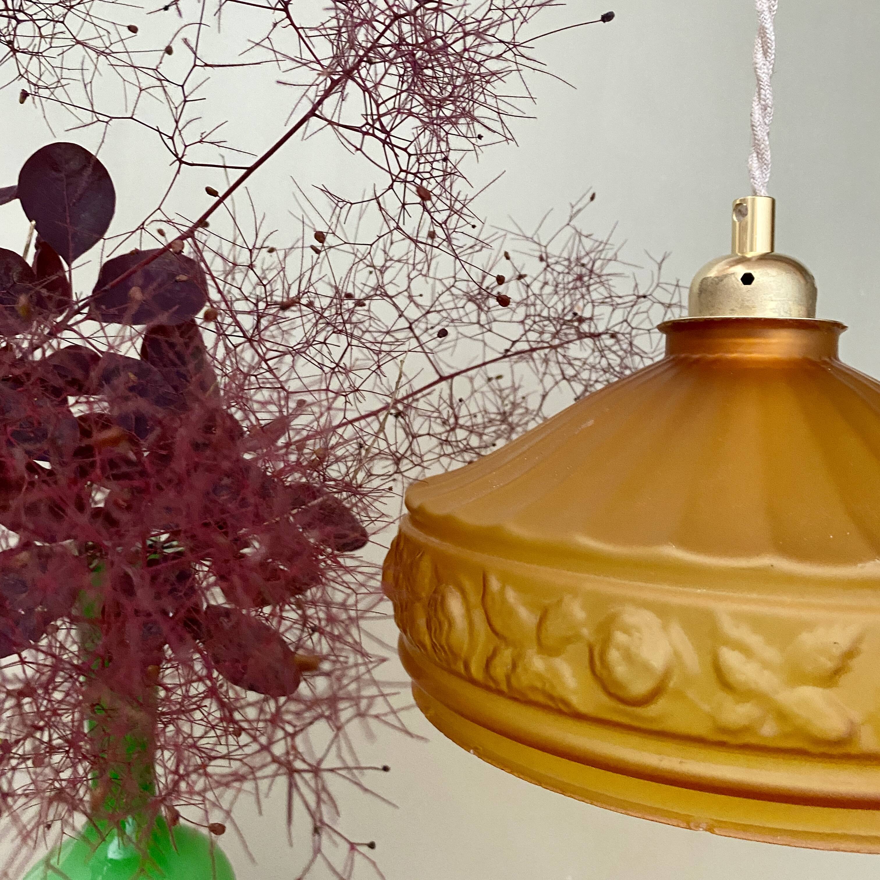 Pendant light with old art deco lampshade in yellow glass